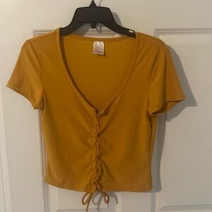 no boundaries mustard cropped tee